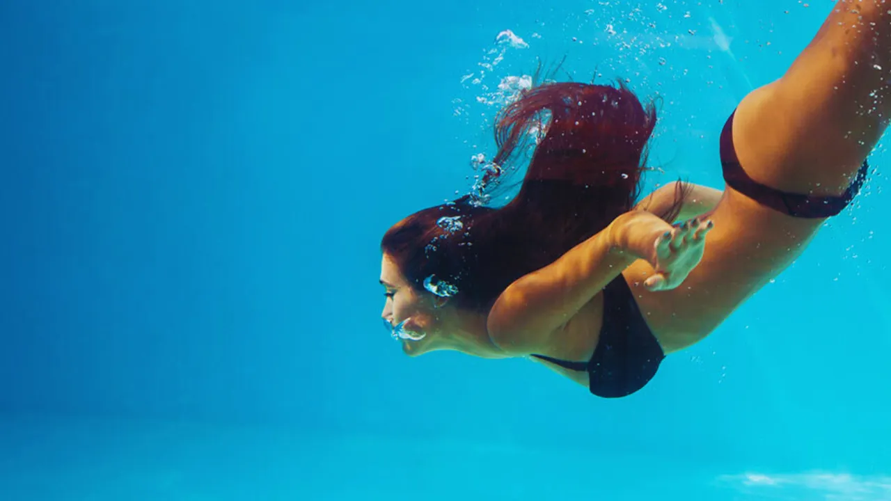 places to tan crossword clue 4 Poolside Hot Spots